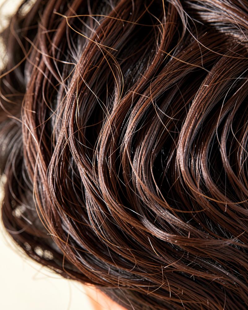 Wavy men's hair texture close-up