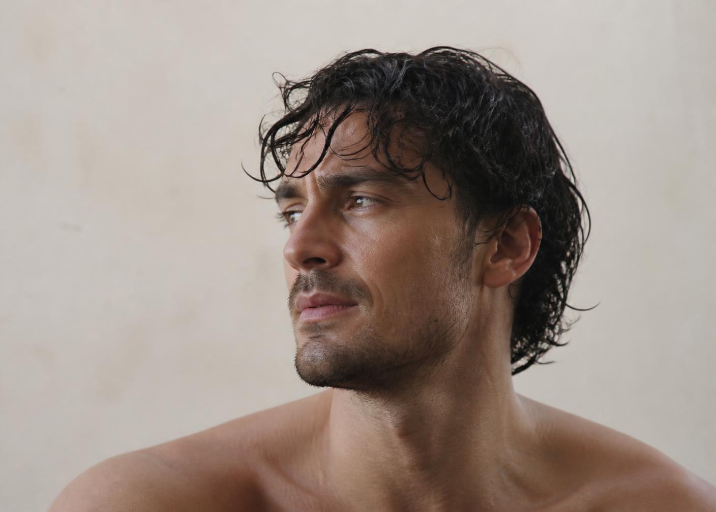 Man with damp textured hair showing visible natural wave